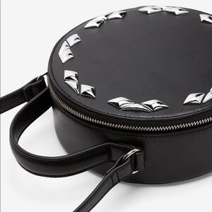 Express circle with silver diamonds crossbody bag